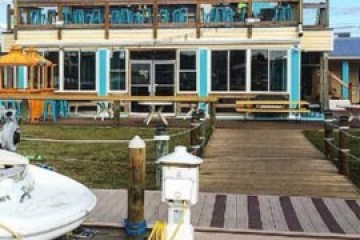 a boat sitting on top of a building